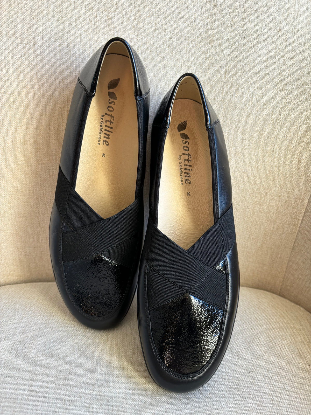 Black comfort cross detail loafers