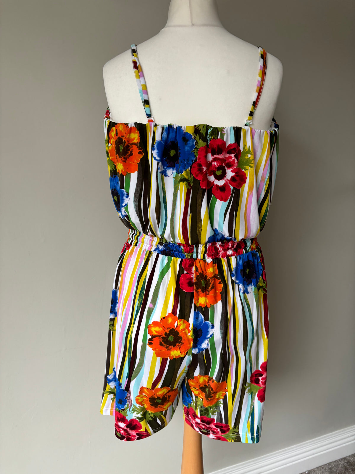 Floral bright coloured playsuit with removable straps Size 22