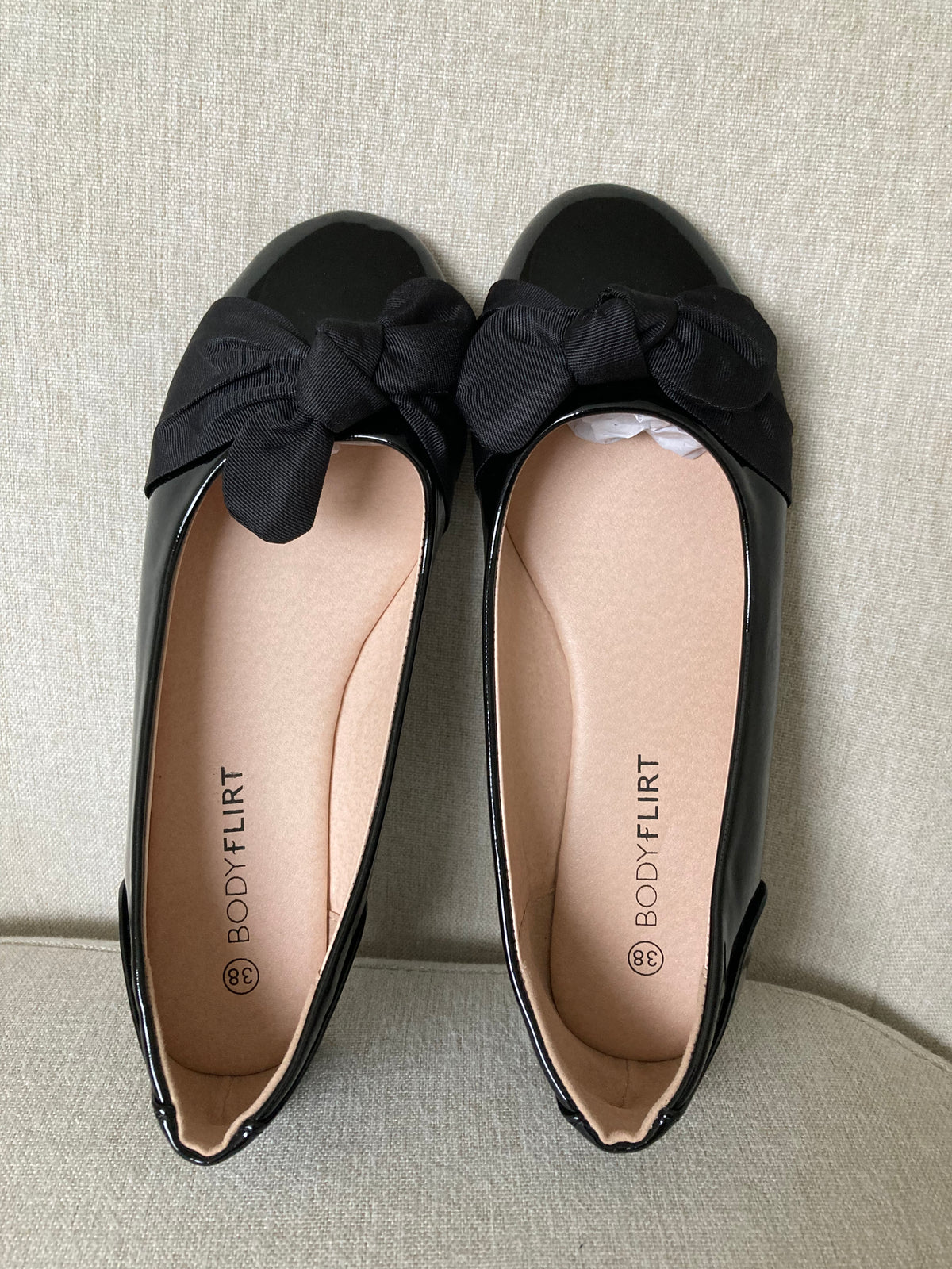 Black flat ballet shoes by Bonprix