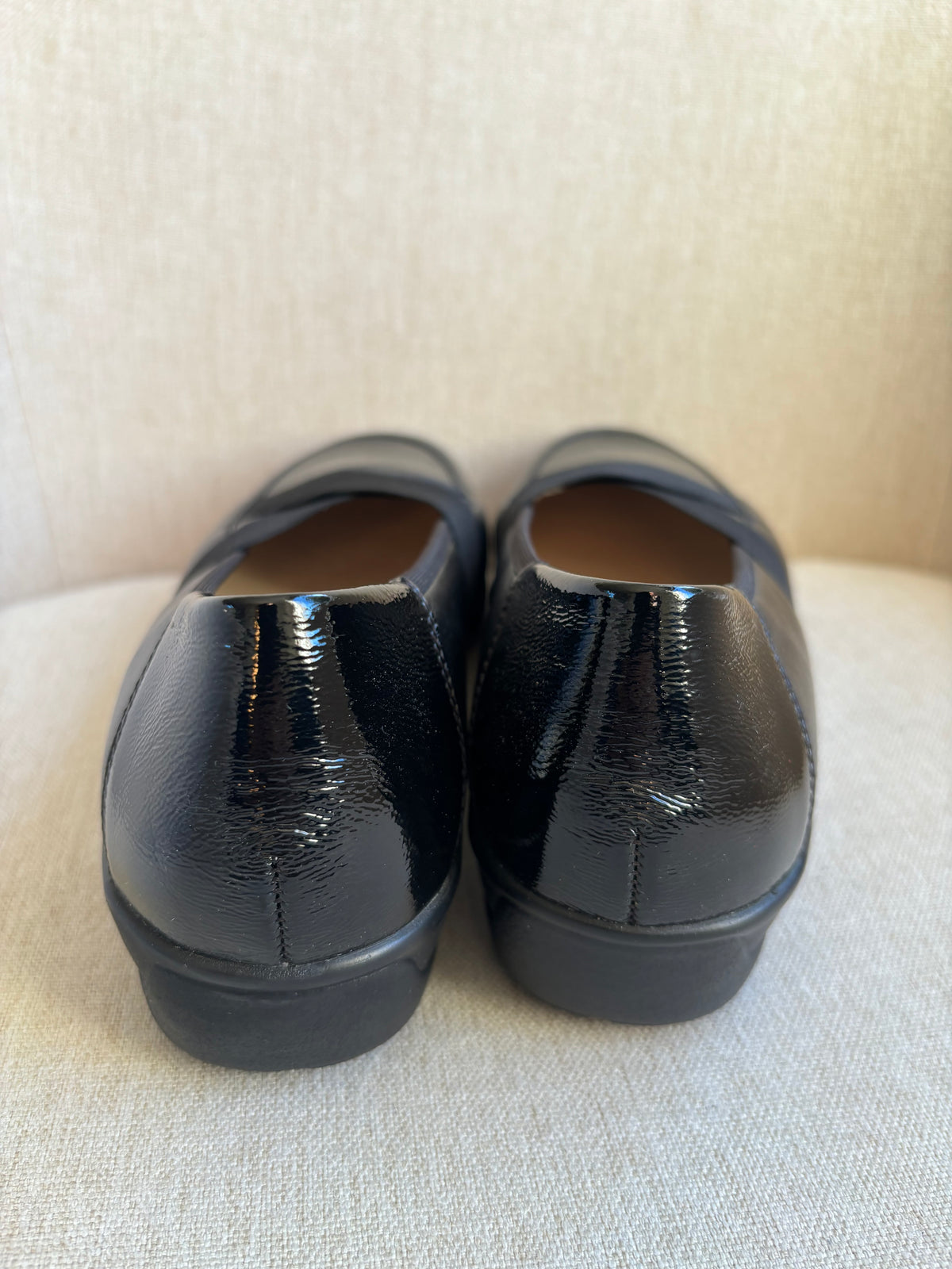 Black comfort cross detail loafers