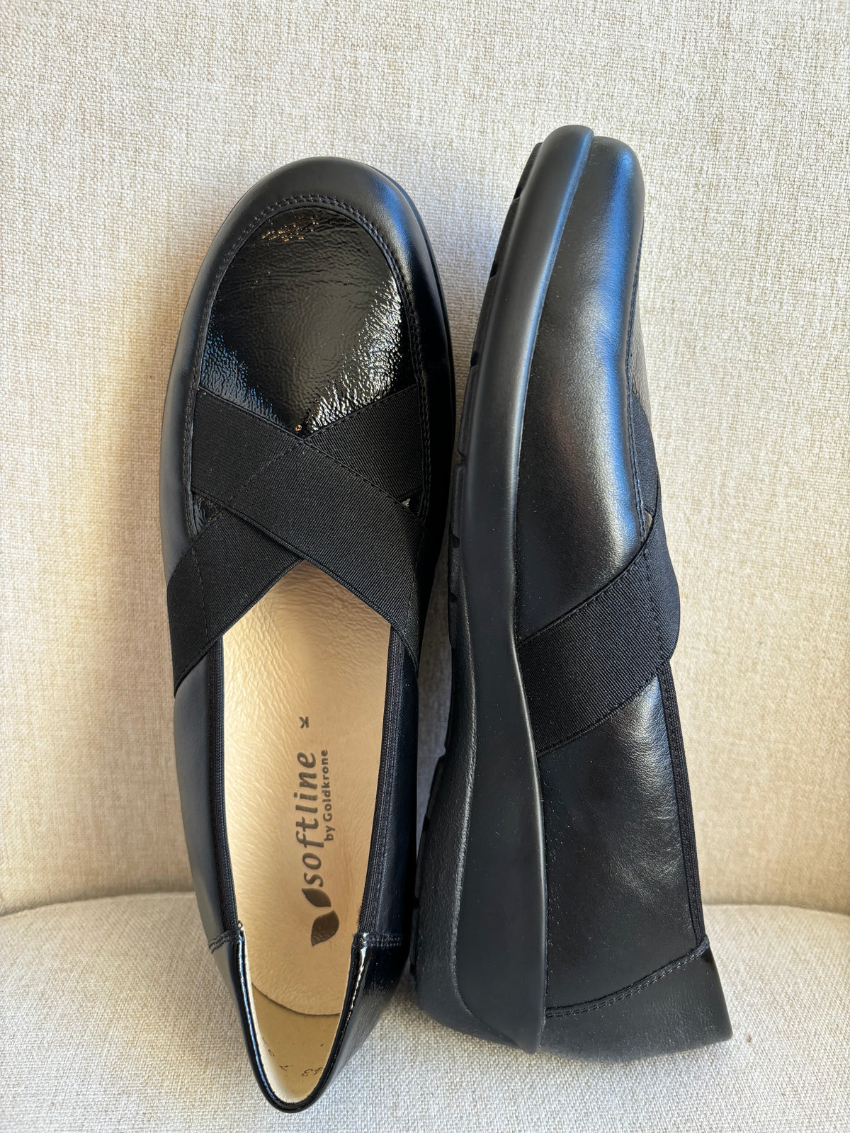 Black comfort cross detail loafers