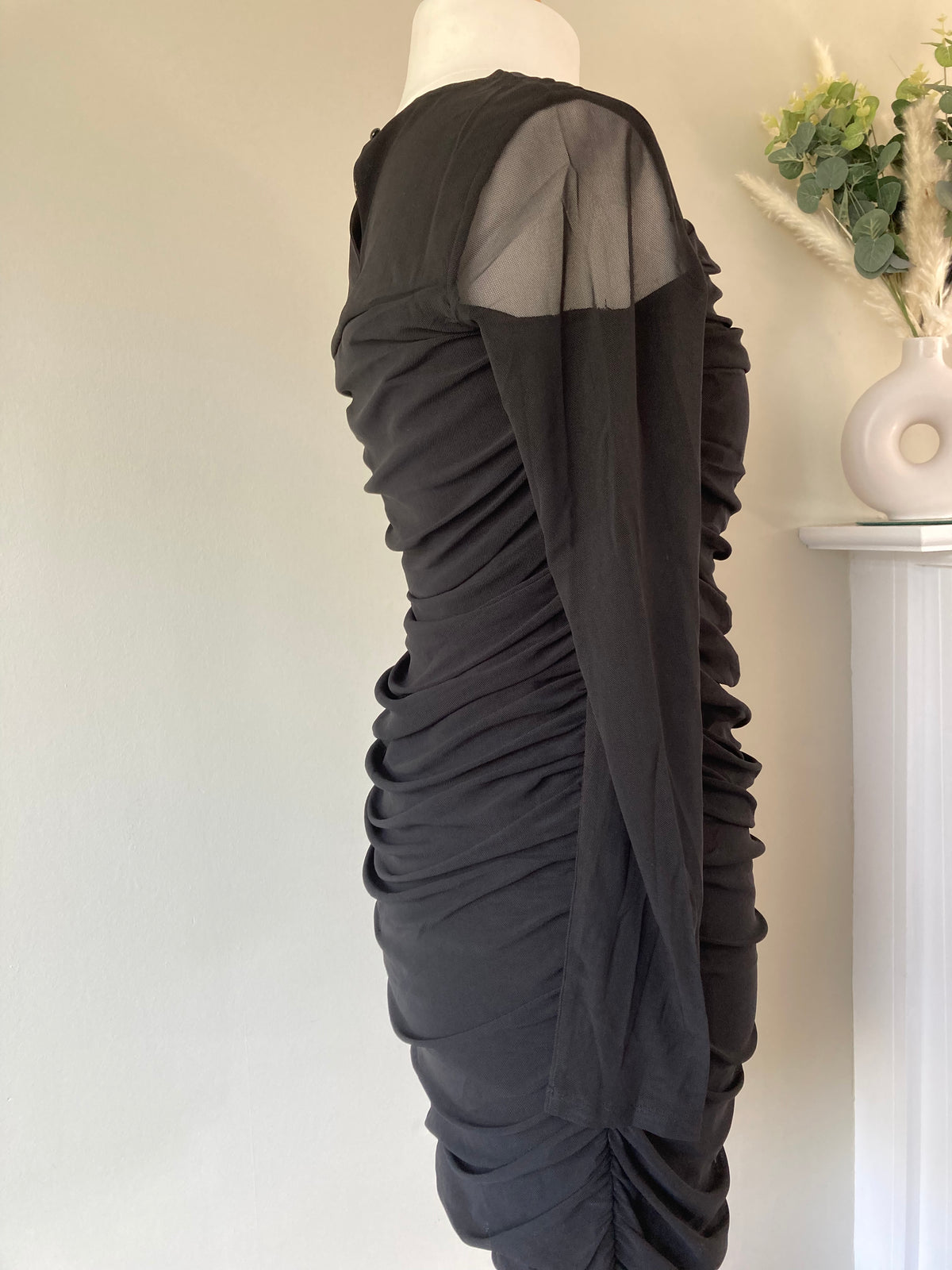 Black net ruffled dress by BODYFLIRT